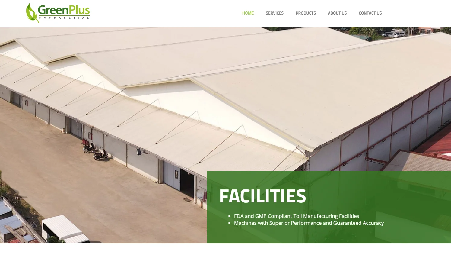 Exterior view of GreenPlus Corporation's manufacturing facility with compliance details displayed.